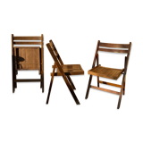 Three wooden folding chairs