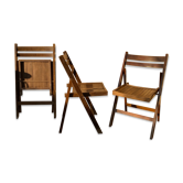 Three wooden folding chairs