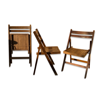 Three wooden folding chairs