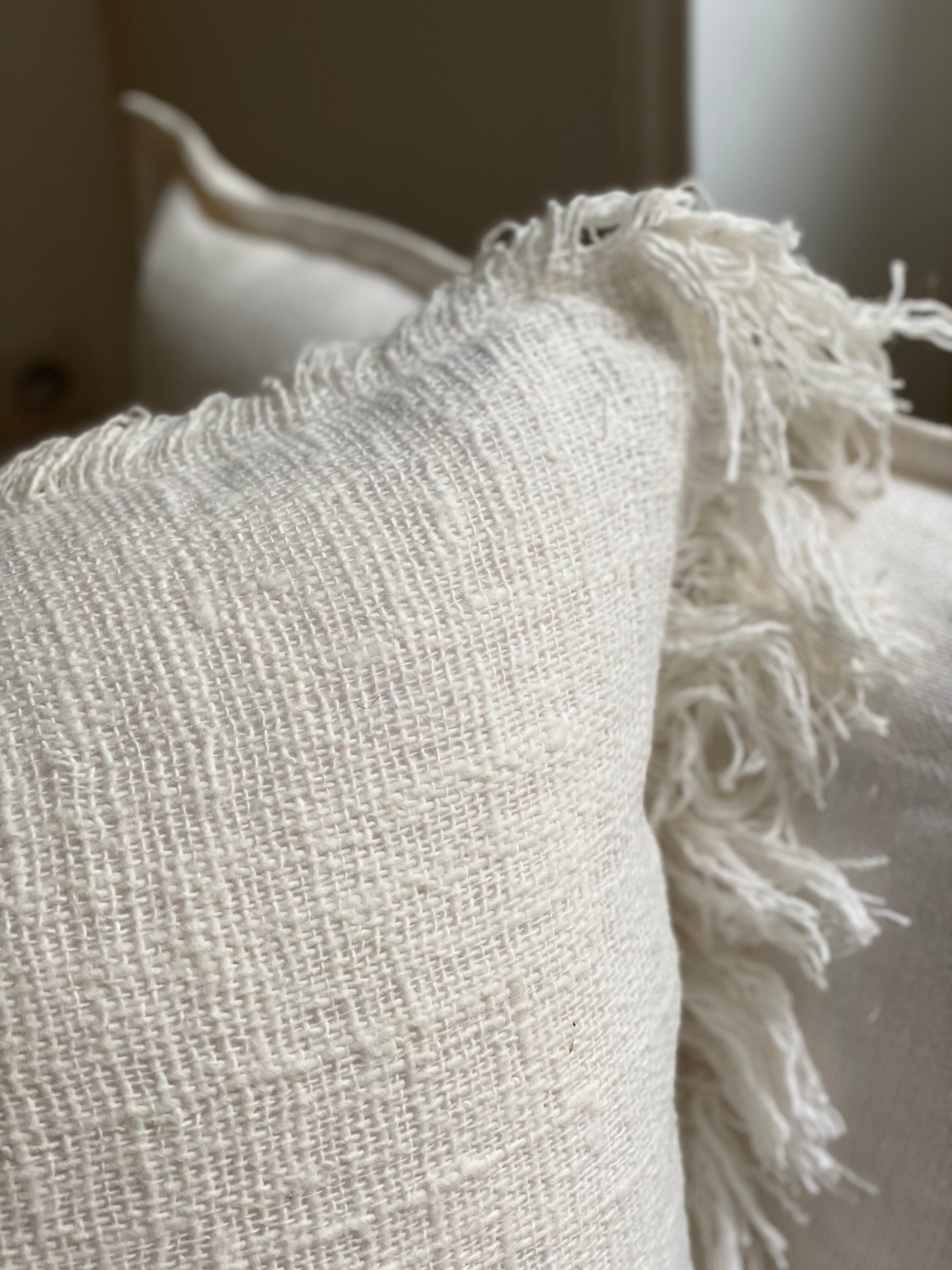 White linen bohemian cushion fringed