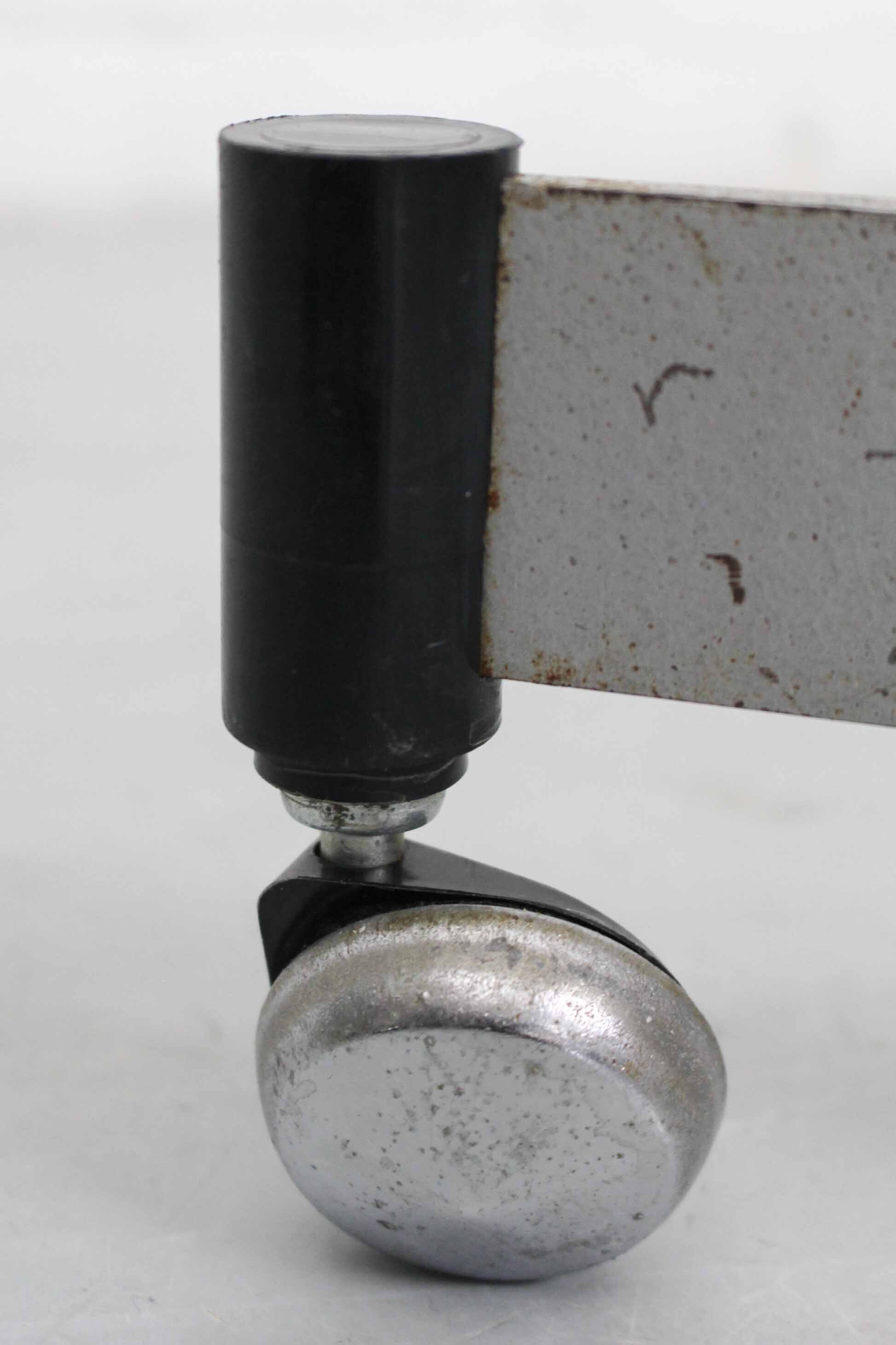 Chrome mid century modern adjustable five-arm lamp on wheel base