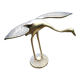 Brass wading bird