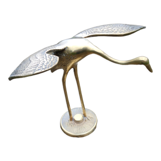 Brass wading bird