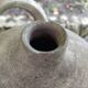 Ancient sandstone jar with two handles