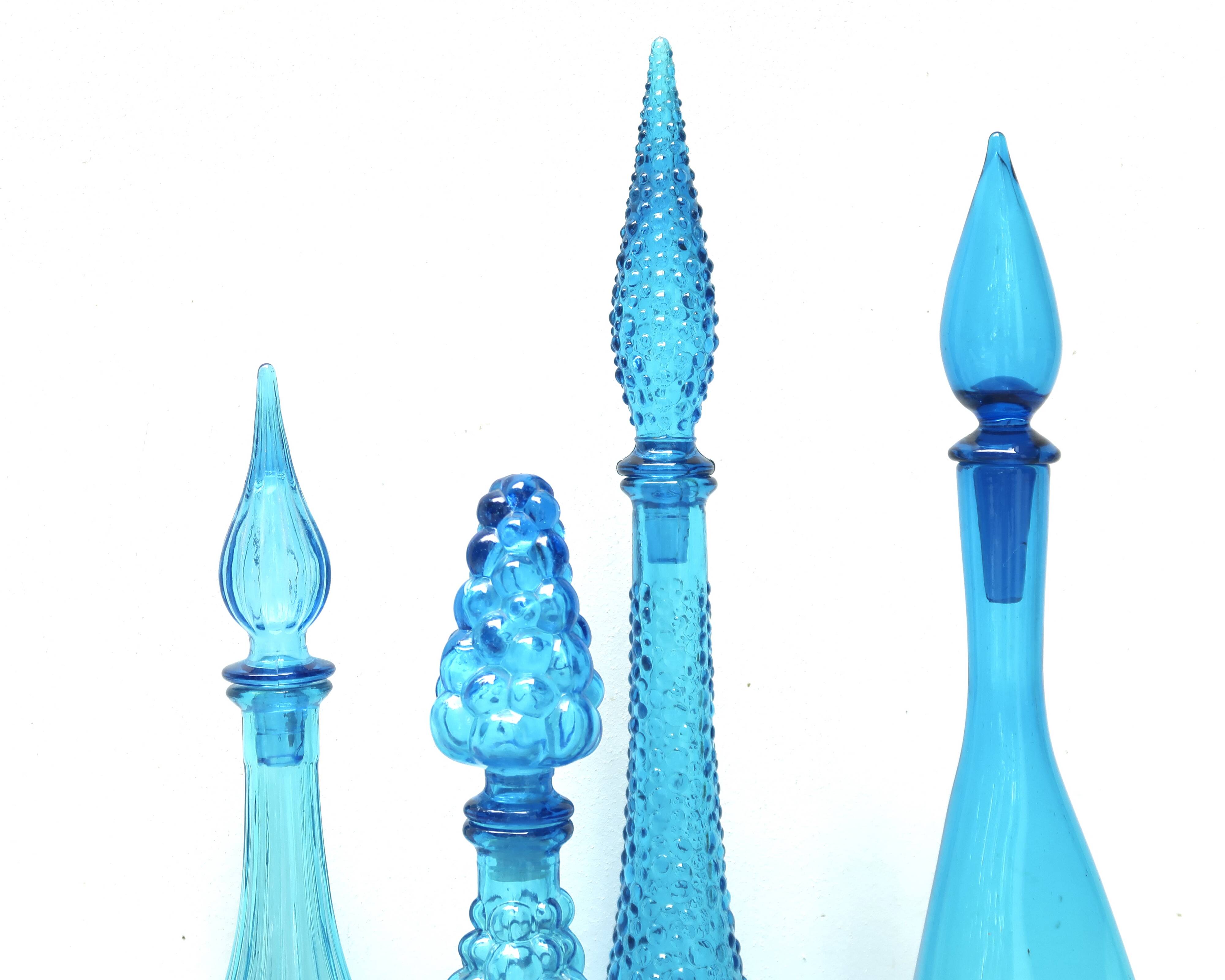 Set of four Italian blue glass carafes, 1960s