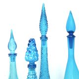 Set of four Italian blue glass carafes, 1960s