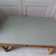 Table basse vintage, piétement, ceinture, tiroir et tablette bois, plateau vert de gris.