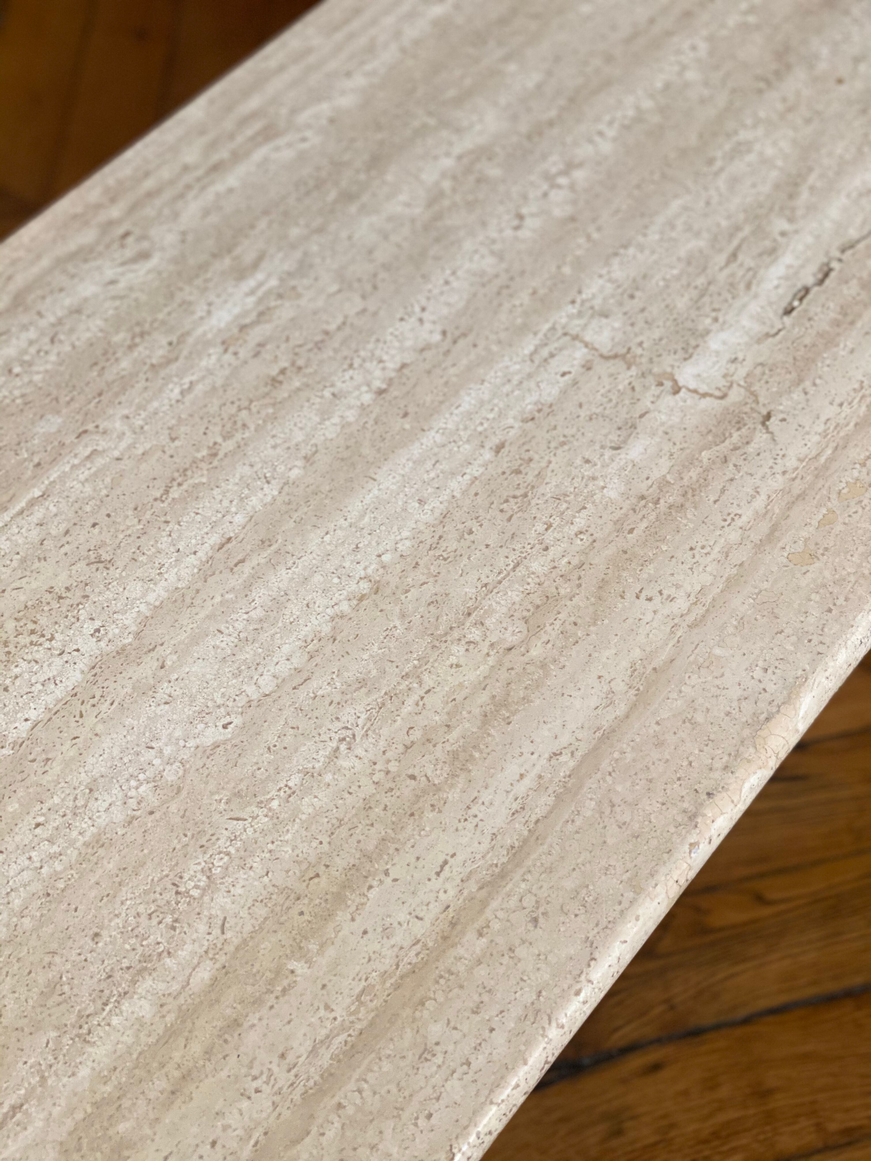 Minimalist design coffee table in unbleached travertine stone