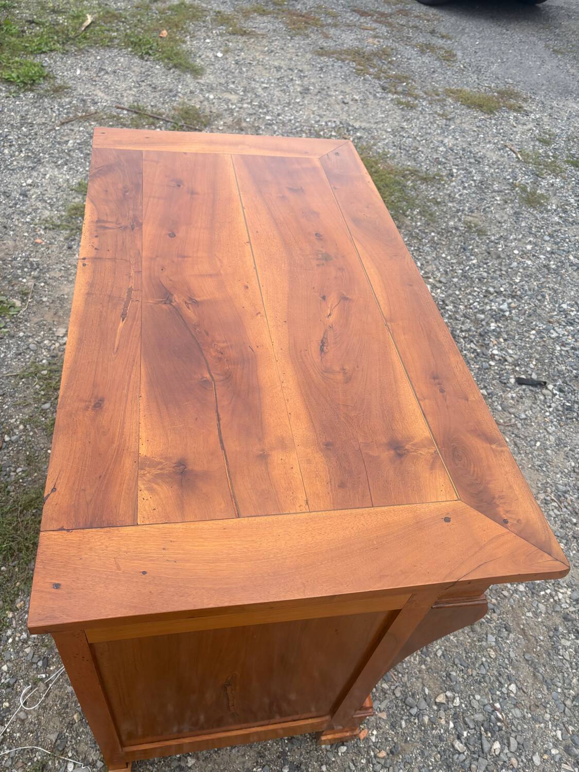 Restoration period walnut chest of drawers with a scroll handle