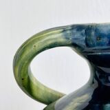 Two-handled ceramic vase with a blue and green gradient pattern.