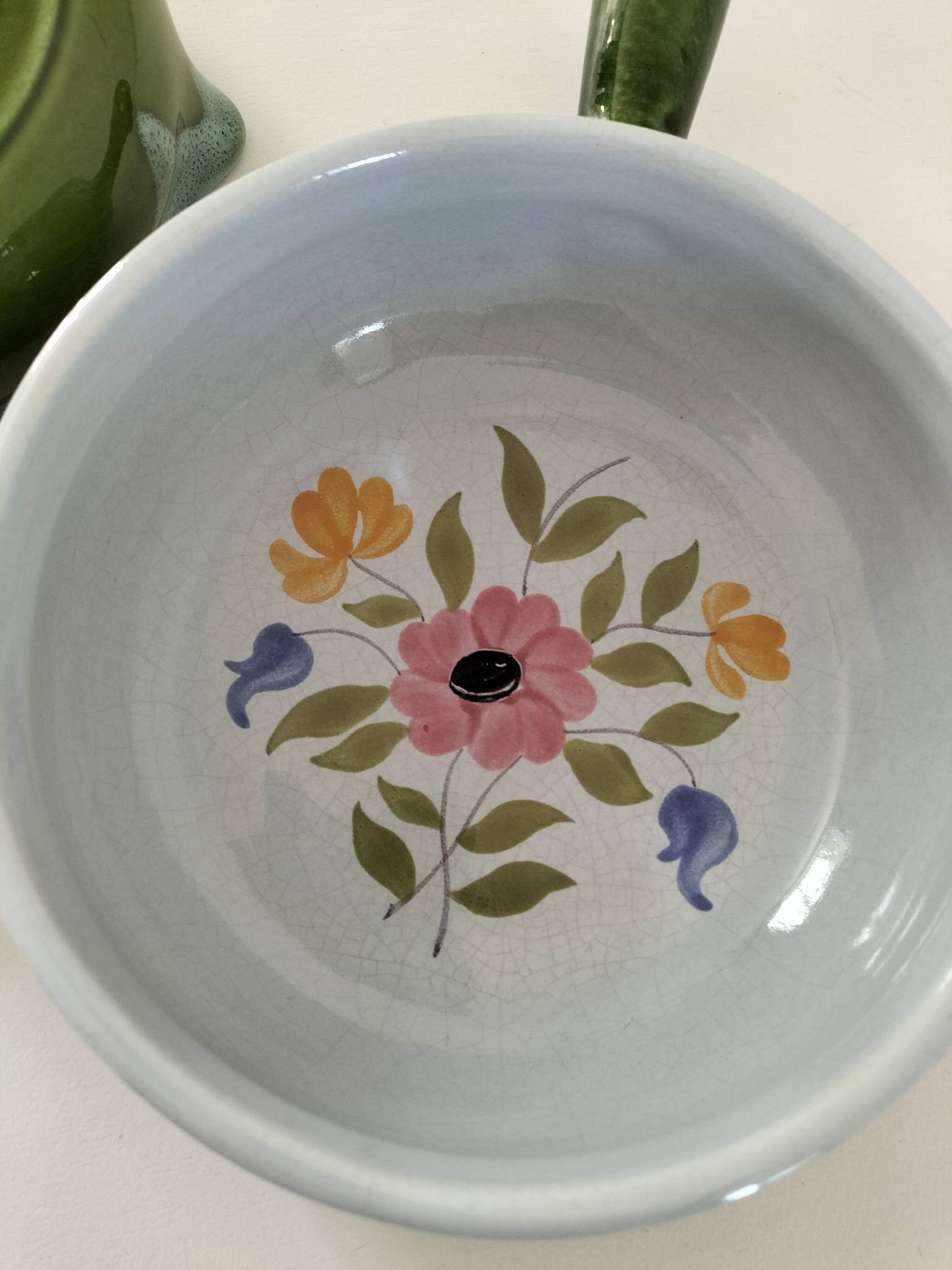 Duo of flowery caquelons