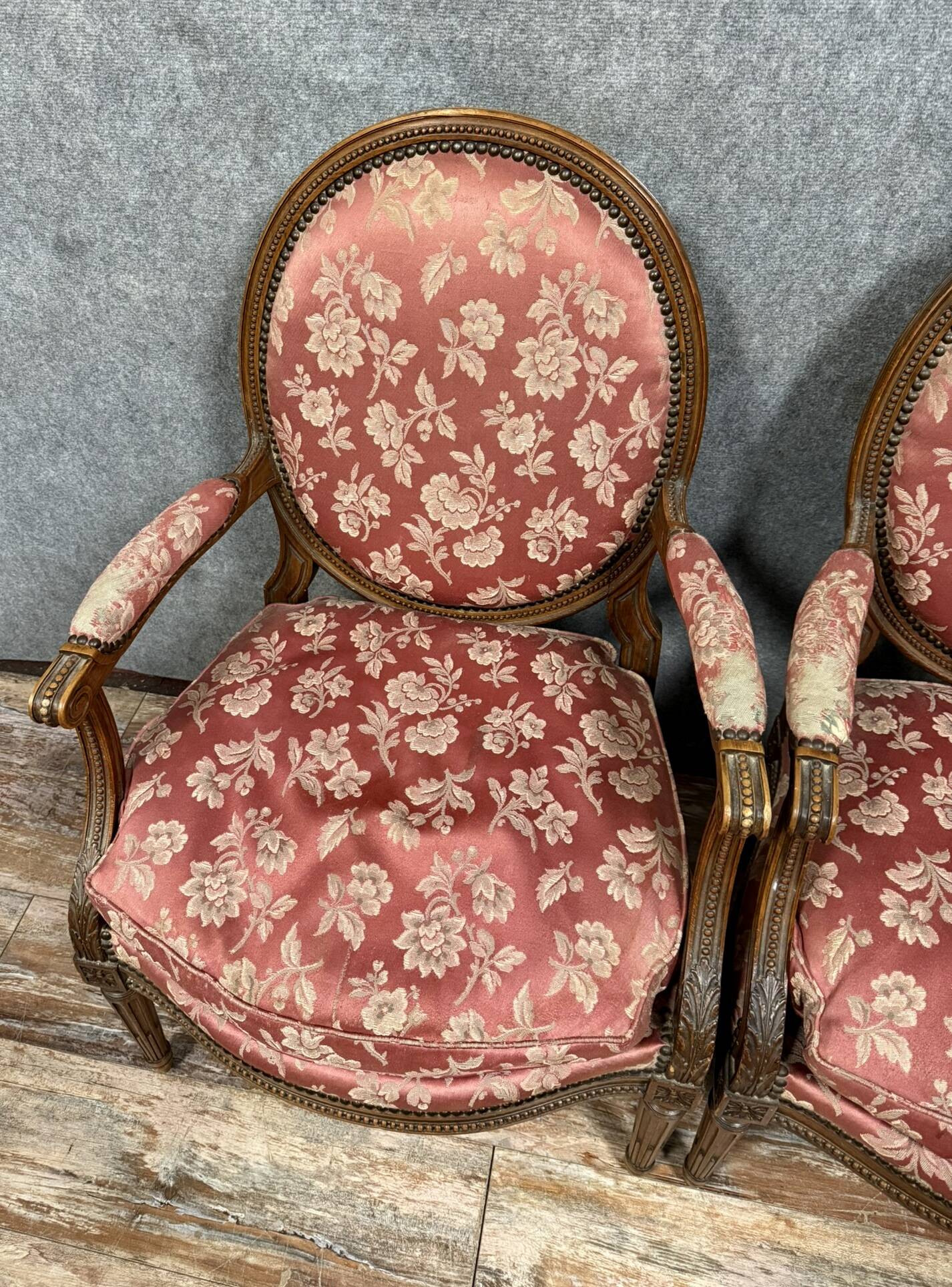 Pair of Louis XVI style armchairs in carved wood circa 1850