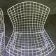 Pair of white lacquered Bertoia chairs