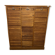 Old filing cabinet with triple curtains