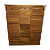 Old filing cabinet with triple curtains
