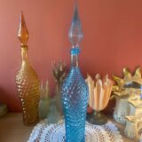 Large turquoise bottle