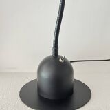 Articulated table lamp on vintage metal flexible