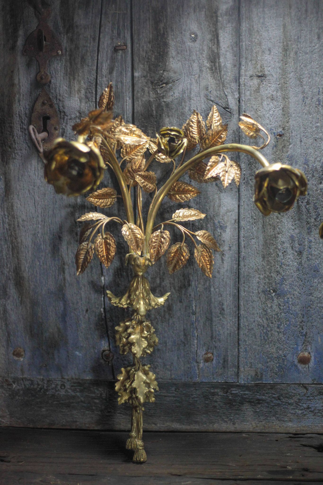 Pair of bronze and gold metal floral wall sconces, flower wall lamp.