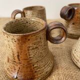 4 pyrite stoneware cups attributed to Jean-Pierre Prudhomme. 1960s.