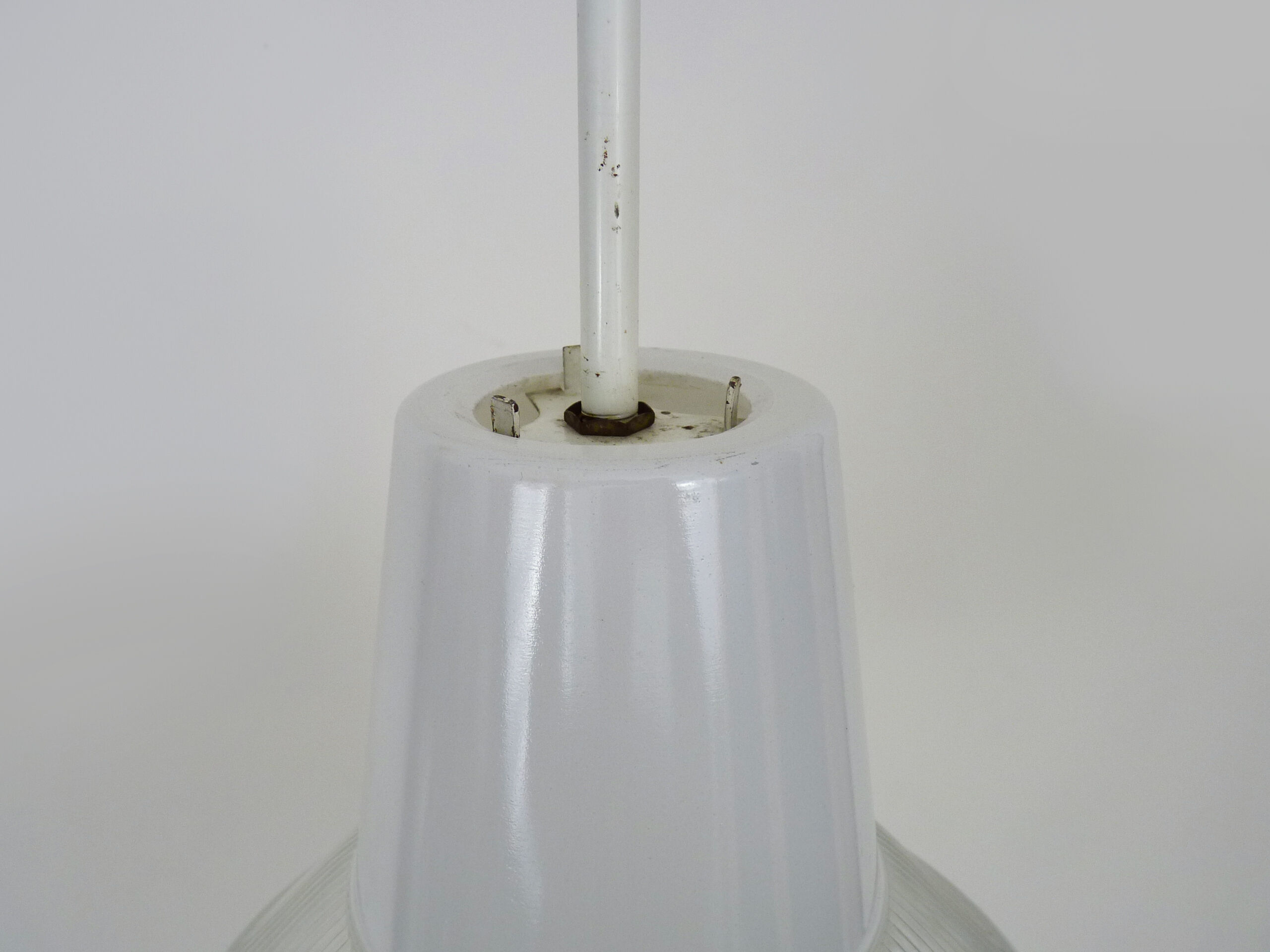 Vintage industrial suspension in glass and metal rod, factory, workshop, garage. Year 50