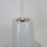 Vintage industrial suspension in glass and metal rod, factory, workshop, garage. Year 50