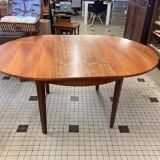 Table ronde en bois avec rallonges intégrées