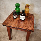 Small farmhouse table, low and square.