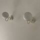 Pair of vintage metal and opaline wall lights, France, 1980.