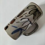 Glazed stoneware mug with free decoration, vintage pottery work.