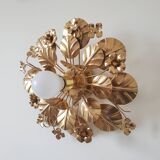 Golden metal flower sconces
