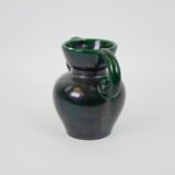 Black and green ceramic vase