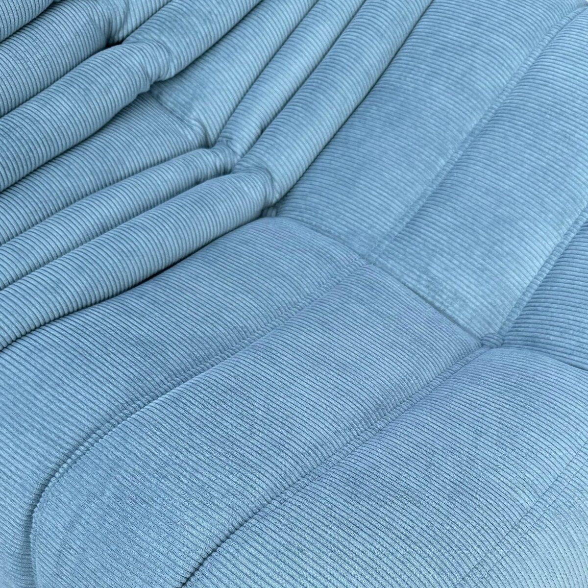 Togo lounge chair in light blue corduroy by Michel Ducaroy for Ligne Roset