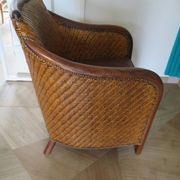 Woven rattan armchair and exotic wood in colonial style, 1980s.
