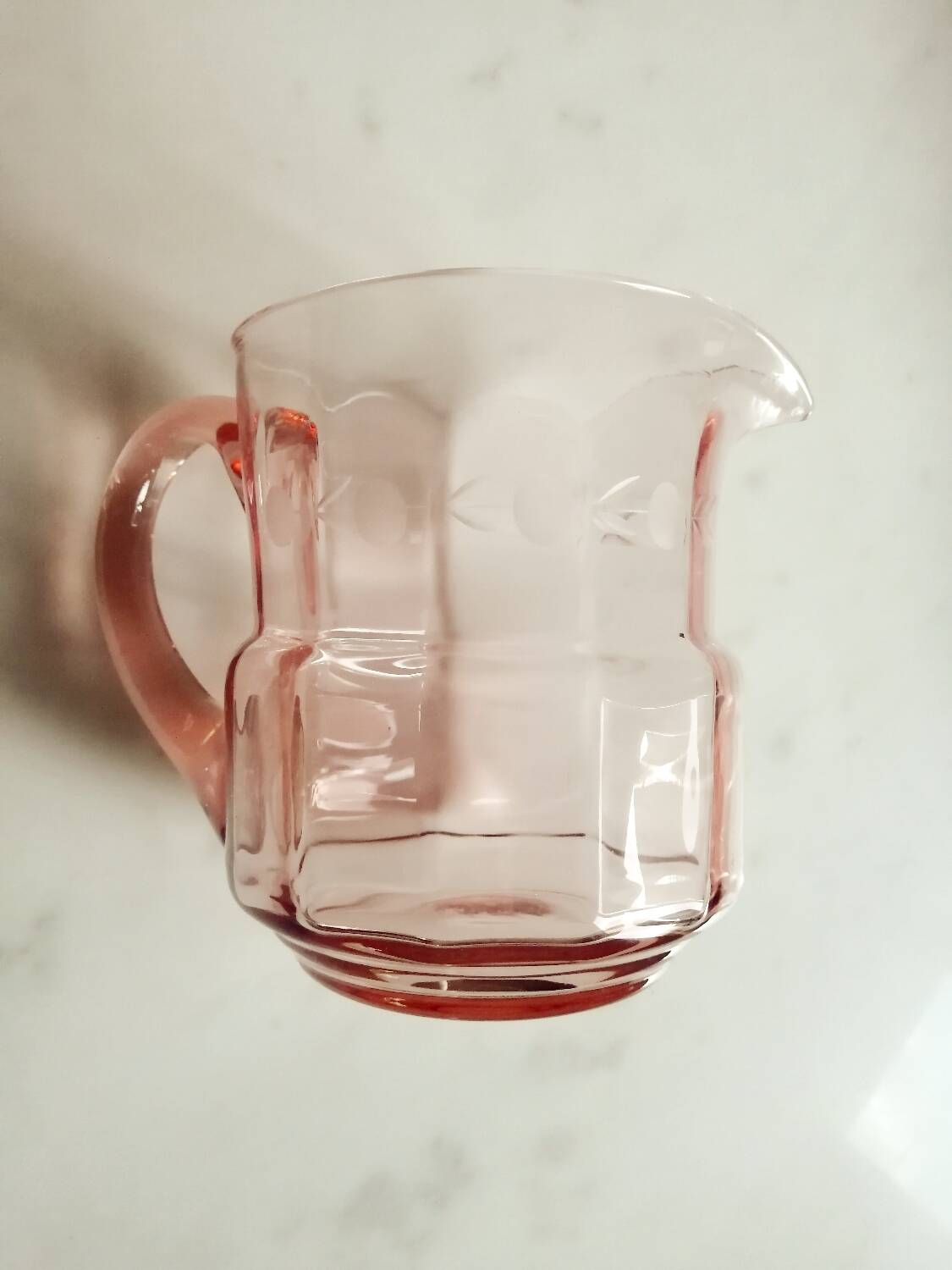 Pitcher and 2 glasses in pink glass