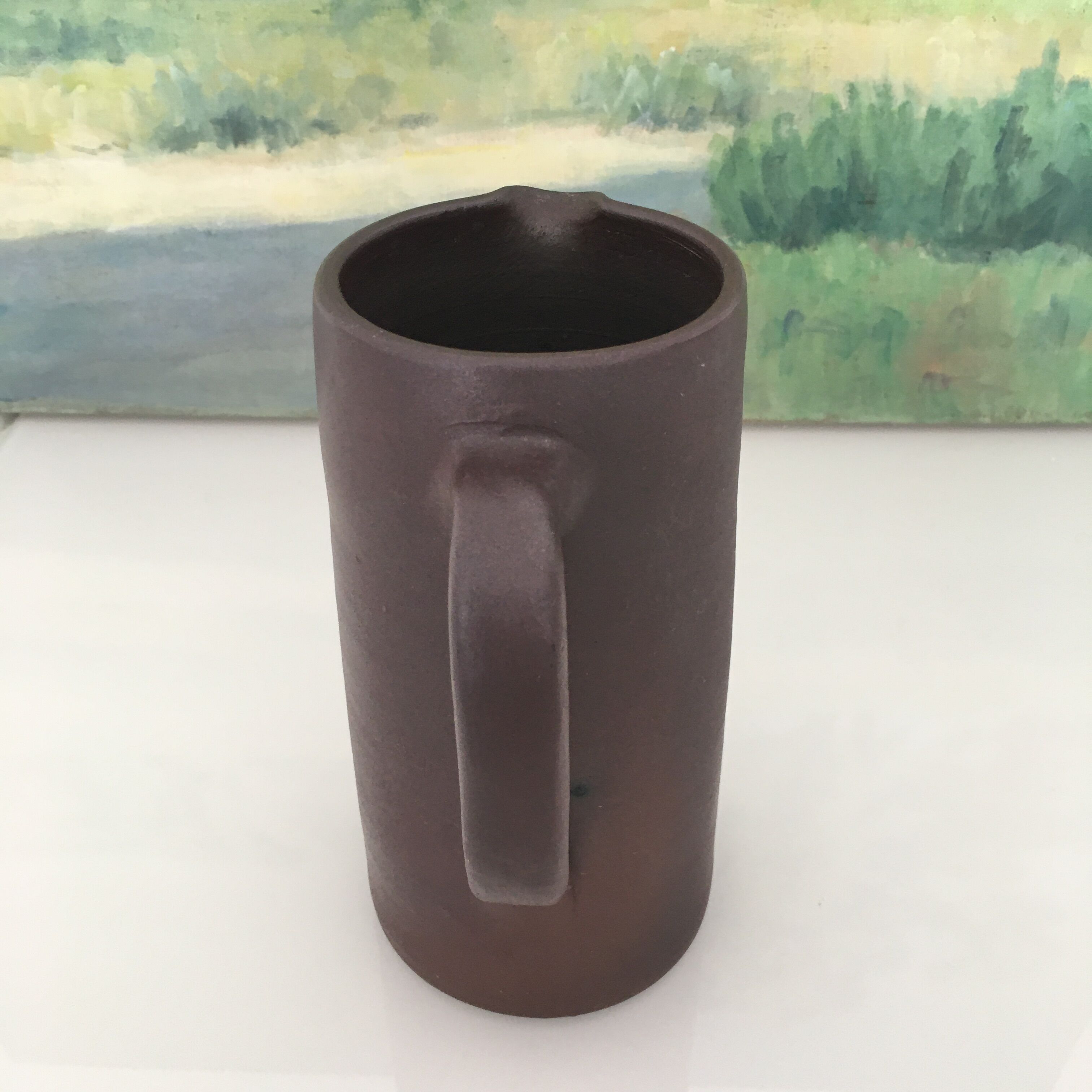 Dark brown sandstone pitcher
