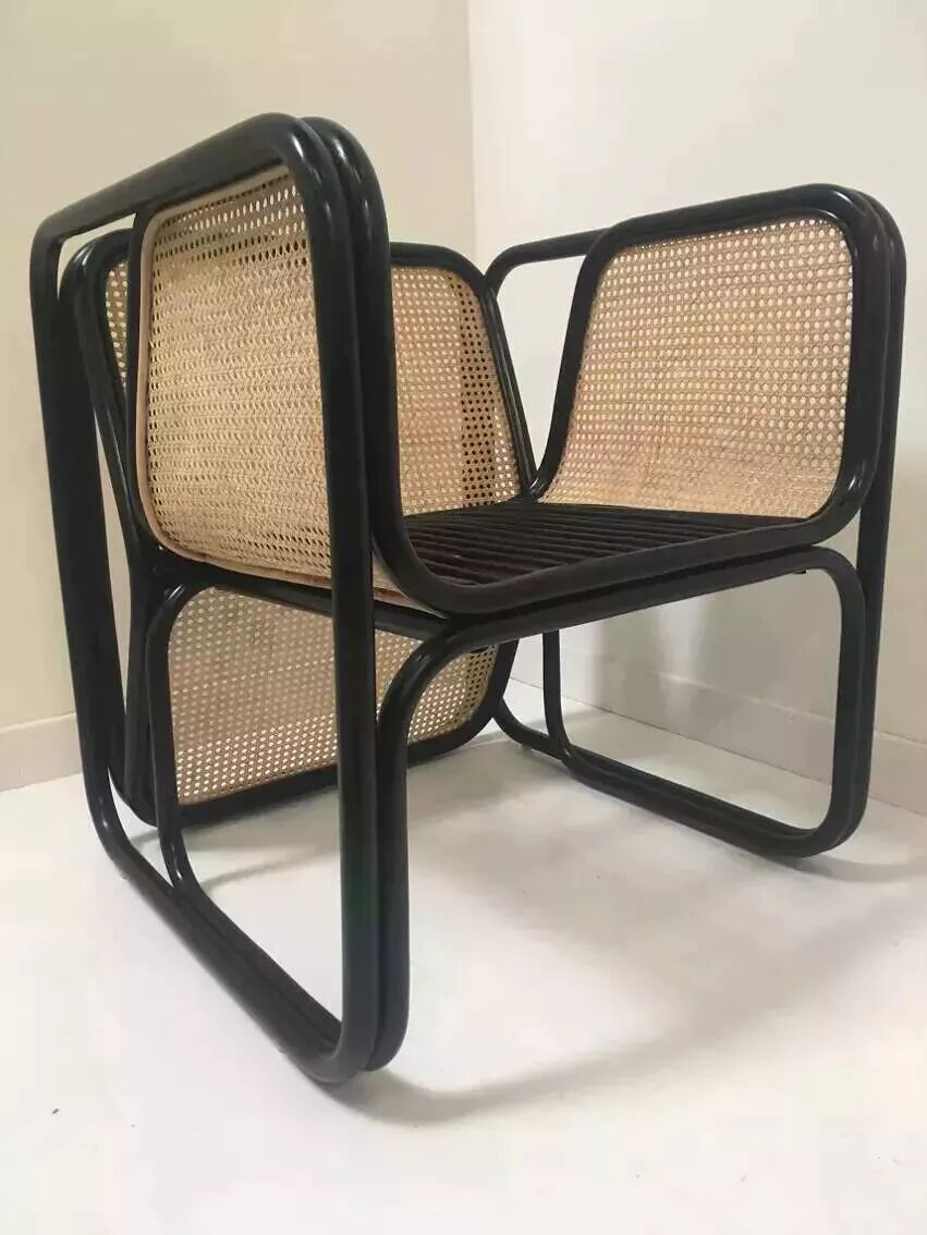 Armchair in black lacquered rattan and natural cane