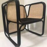 Armchair in black lacquered rattan and natural cane