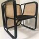 Fauteuil en rotin laqué noir et cannage naturel