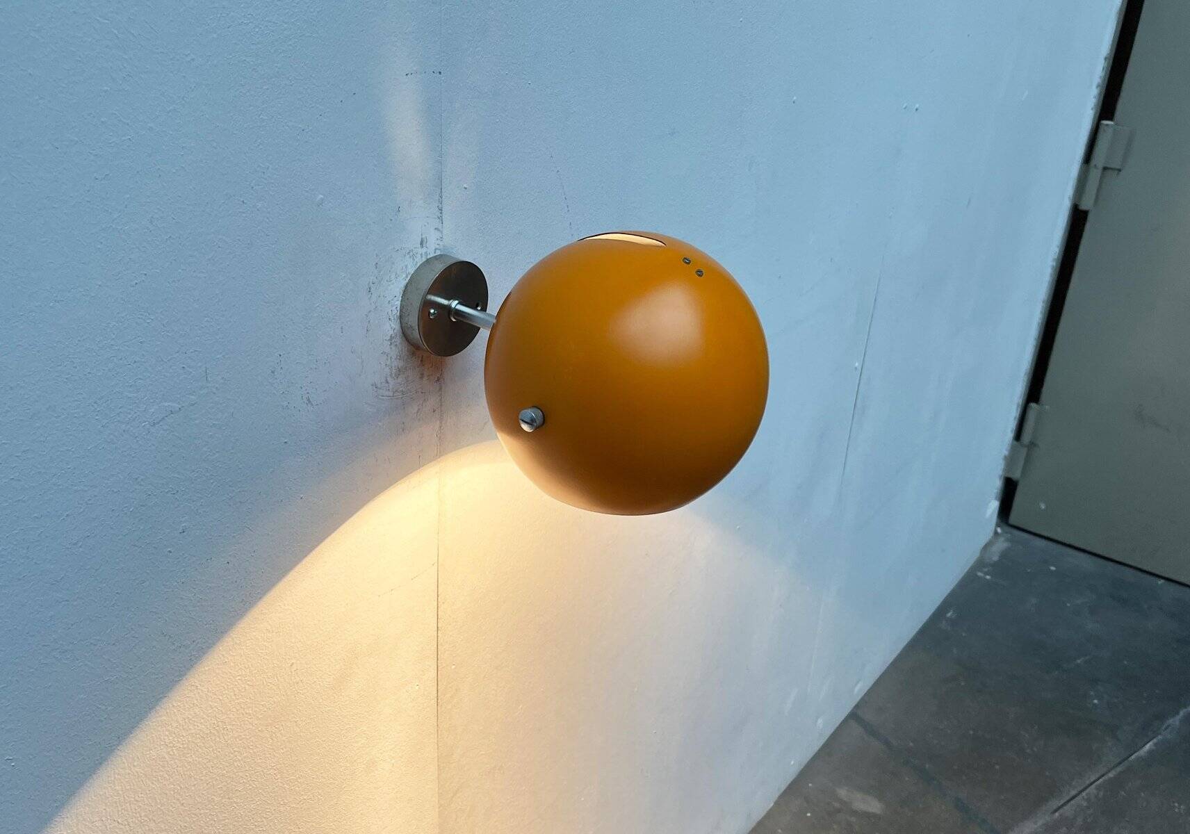 Mid-century Danish space age yellow ball wall lamps by Louis Poulsen, 1960s, set of 3.