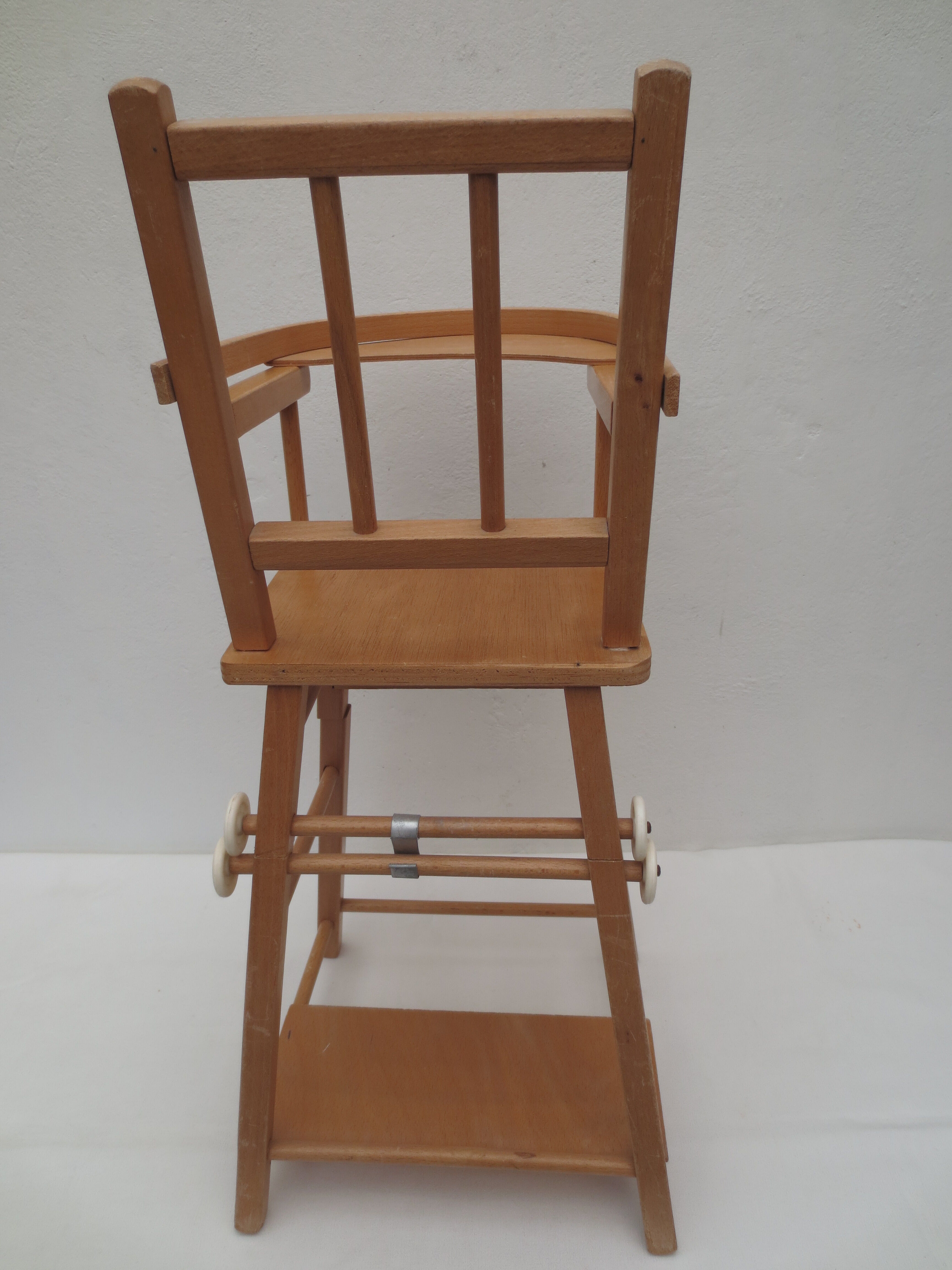 doll high chair with bars, light wood