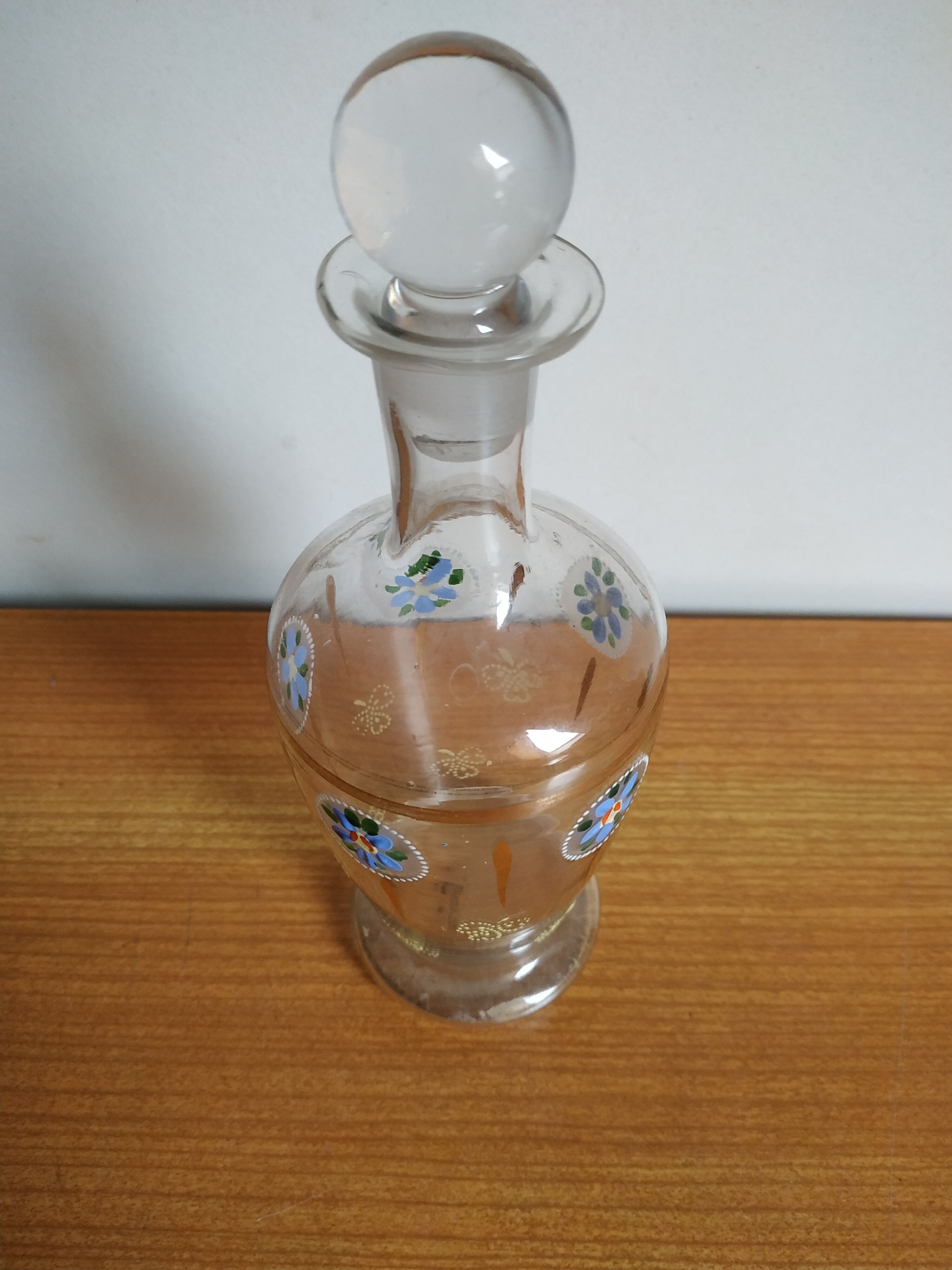 Enamelled glass carafe