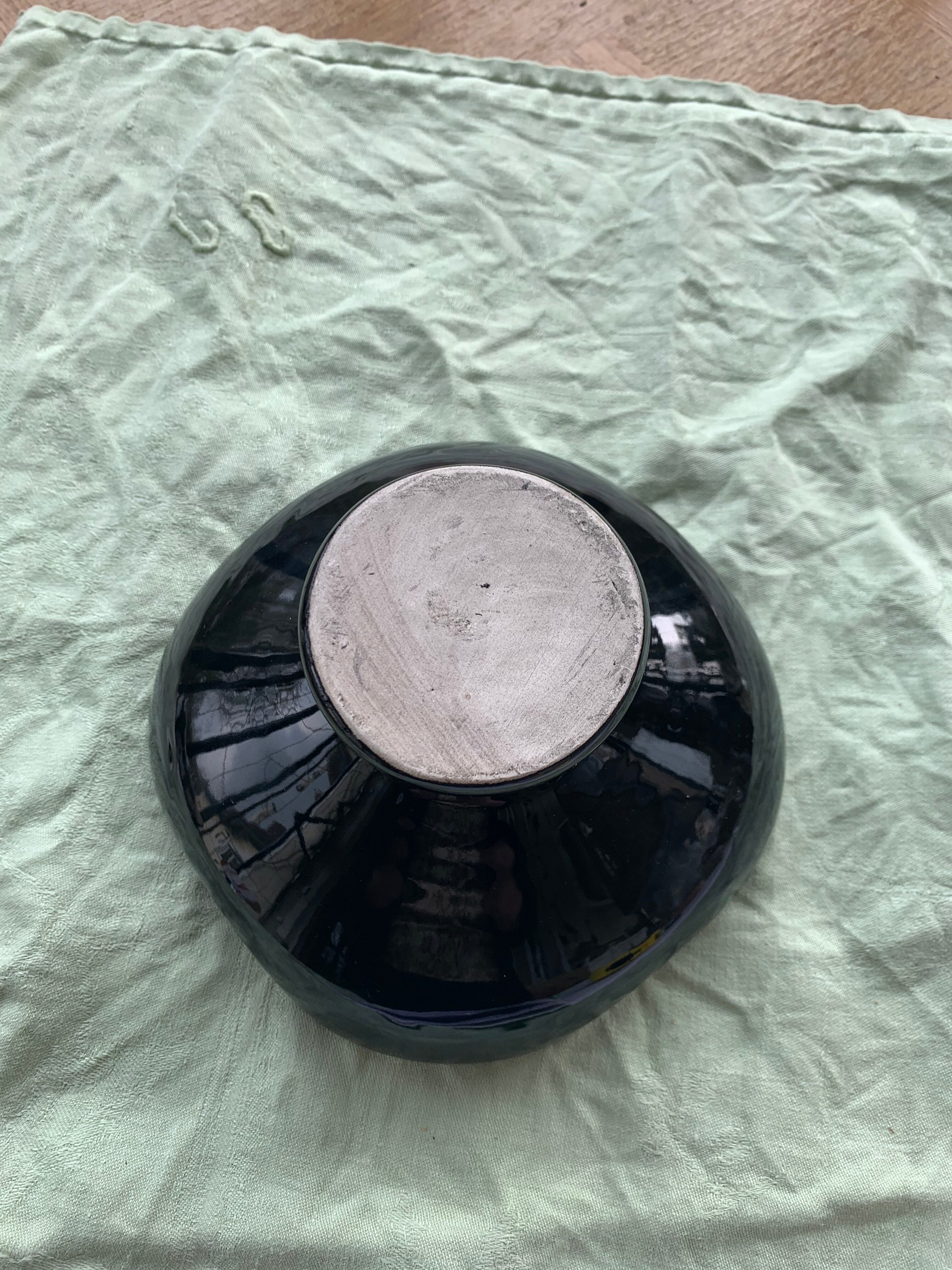 Flamed enamelled ceramic candle holder