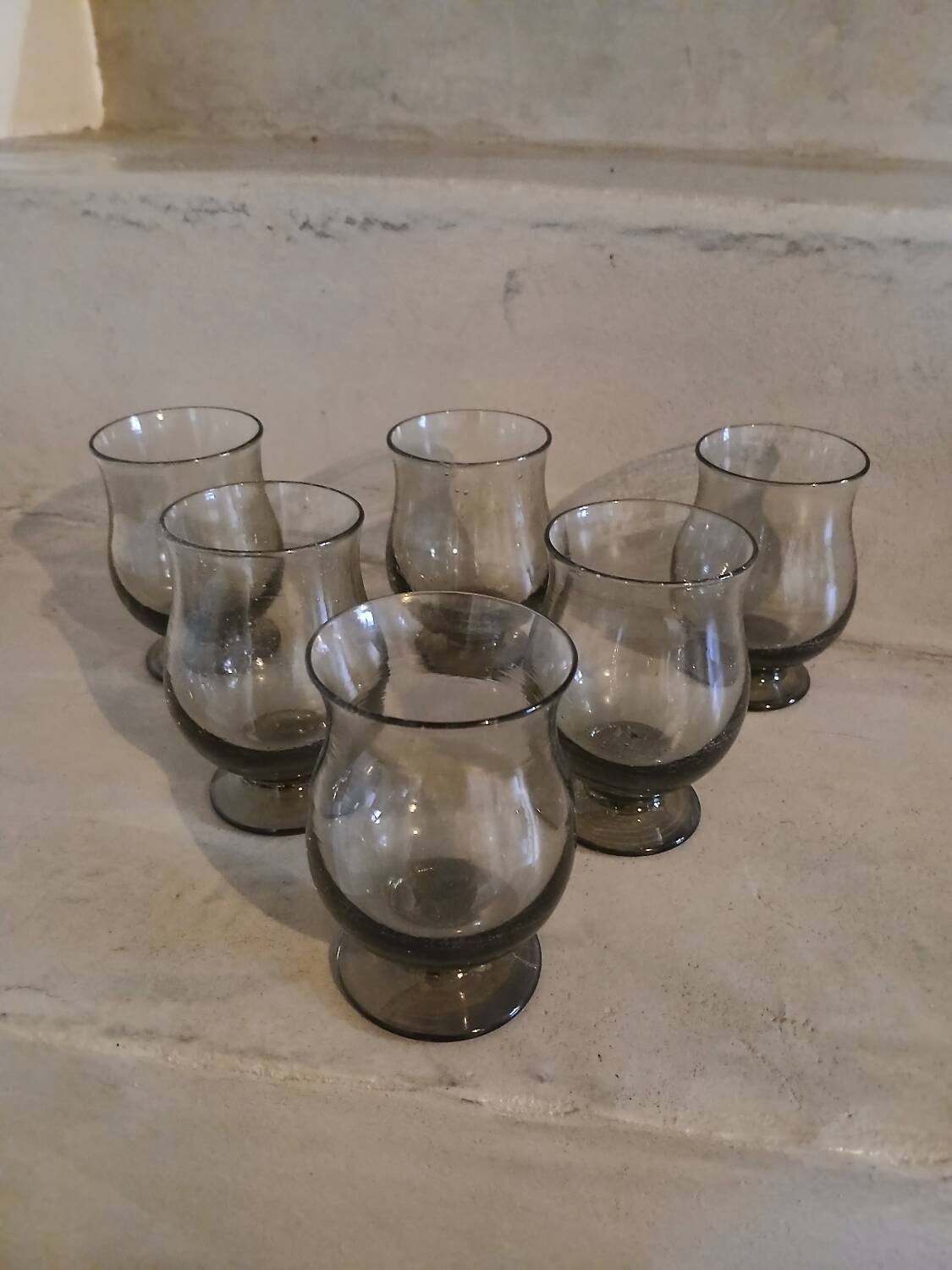 6 old smoked glasses with bubbles