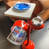 Red magazine ashtray on stand from the 70s