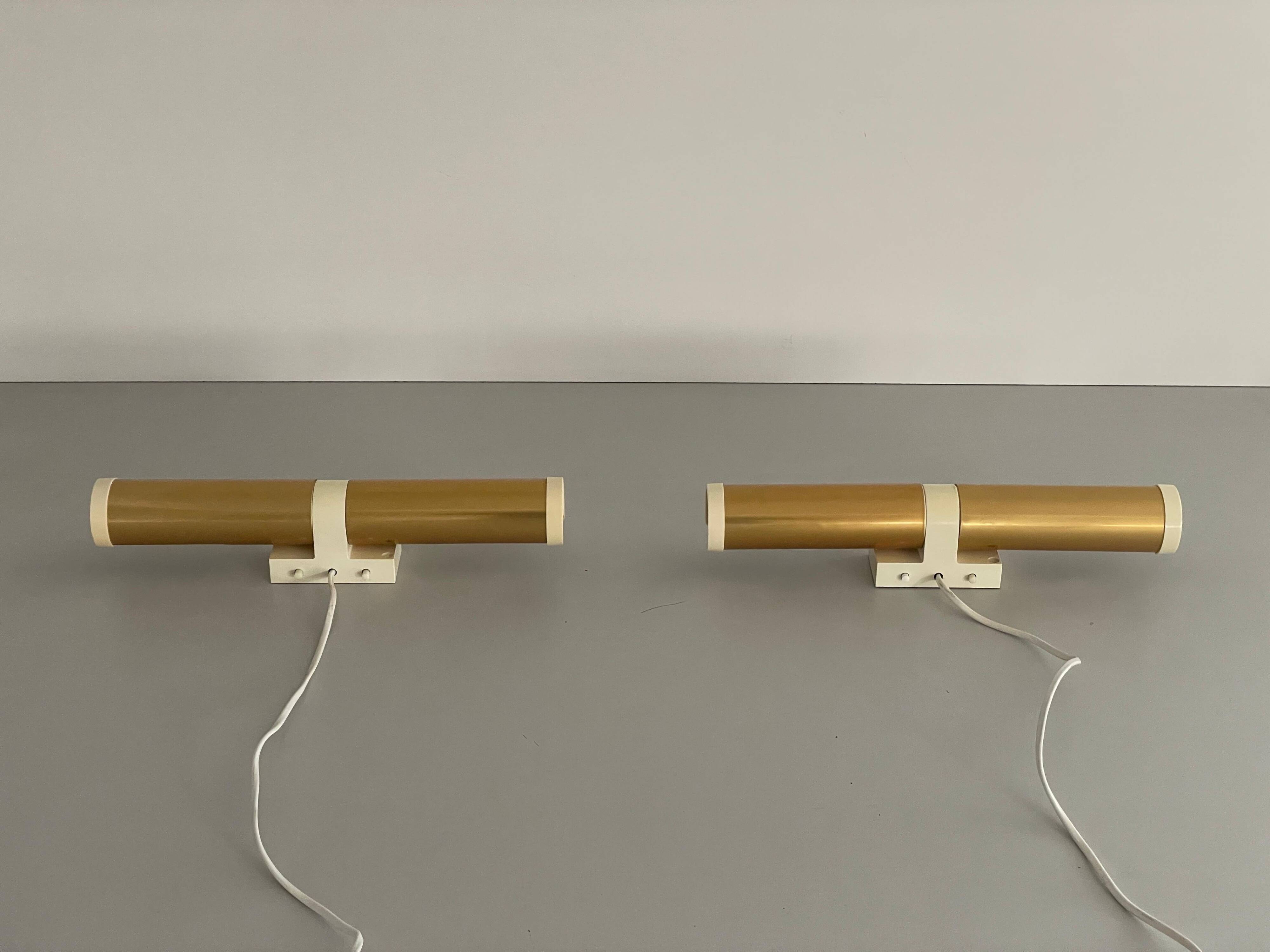 Pair of two-headed wall sconces in gold metal by ERCO, 1970s, Germany