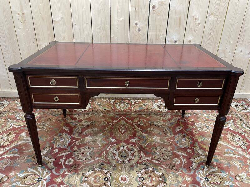 Bureau plat de style Louis XVI acajou et cuir rouge