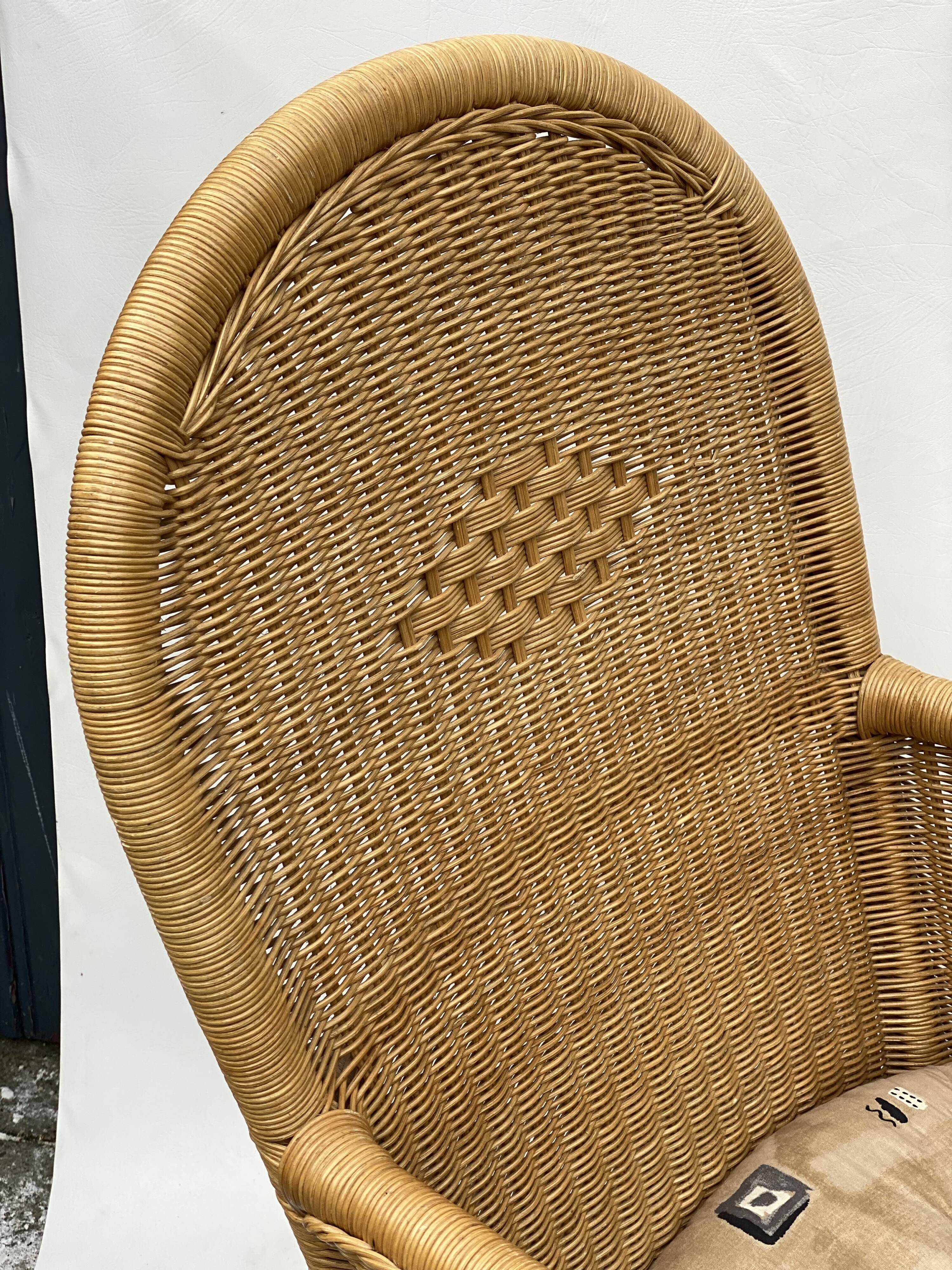 Vintage rotan and teak rocking chair