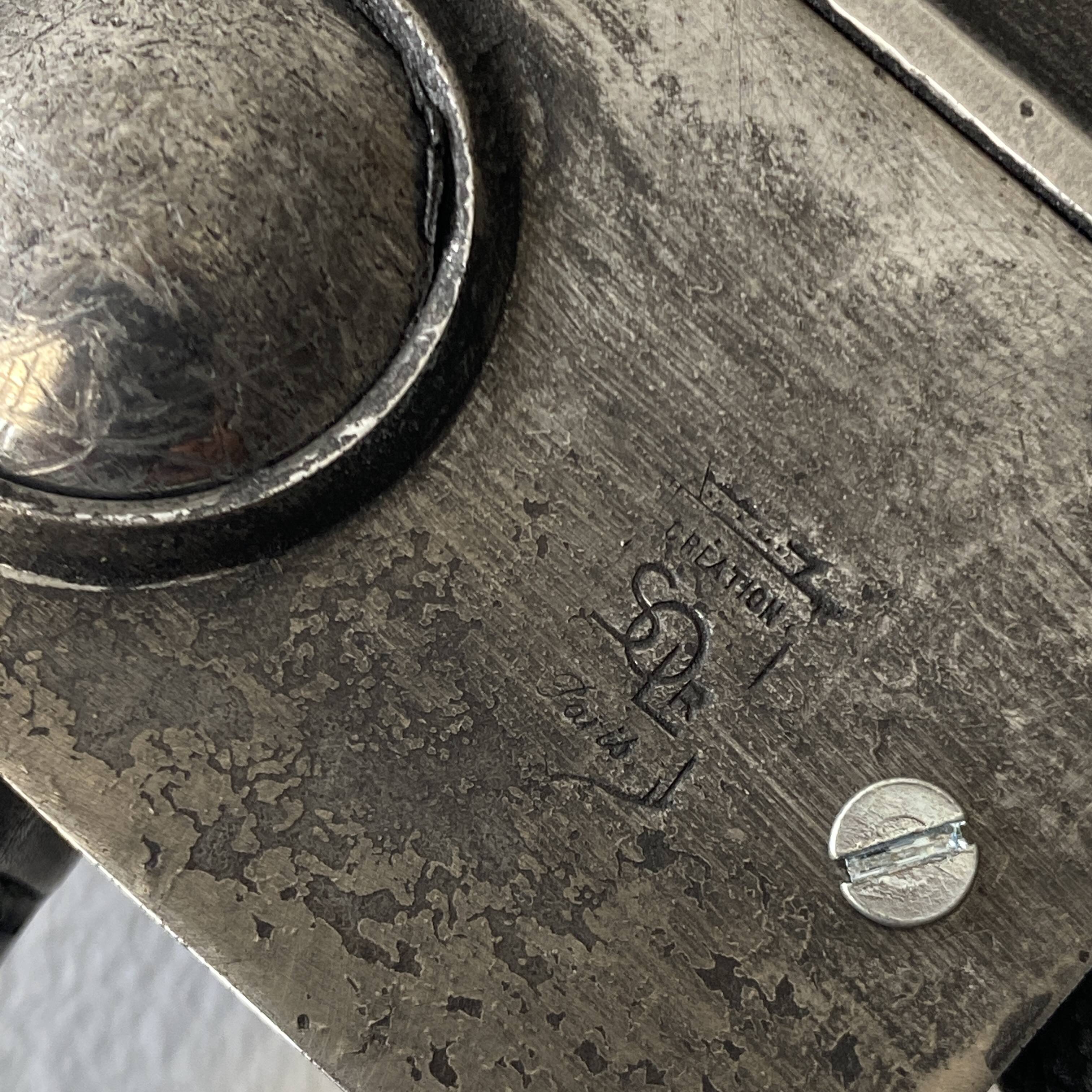 Old industrial wall light with counterweight.