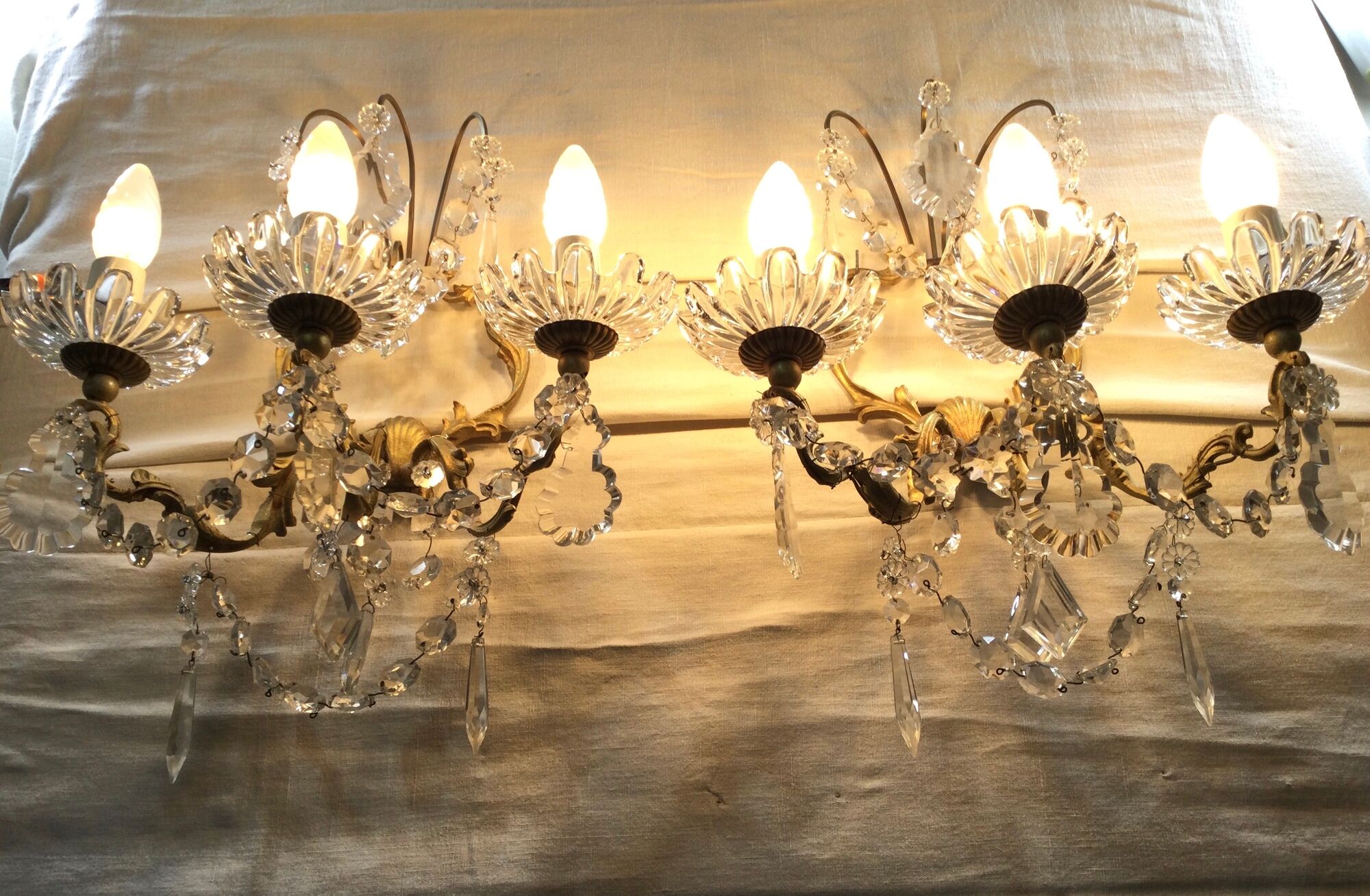 Pair of 3-light bronze and crystal wall lights