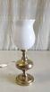 Table lamp in gilded brass and opaline globe - mid 20th century.